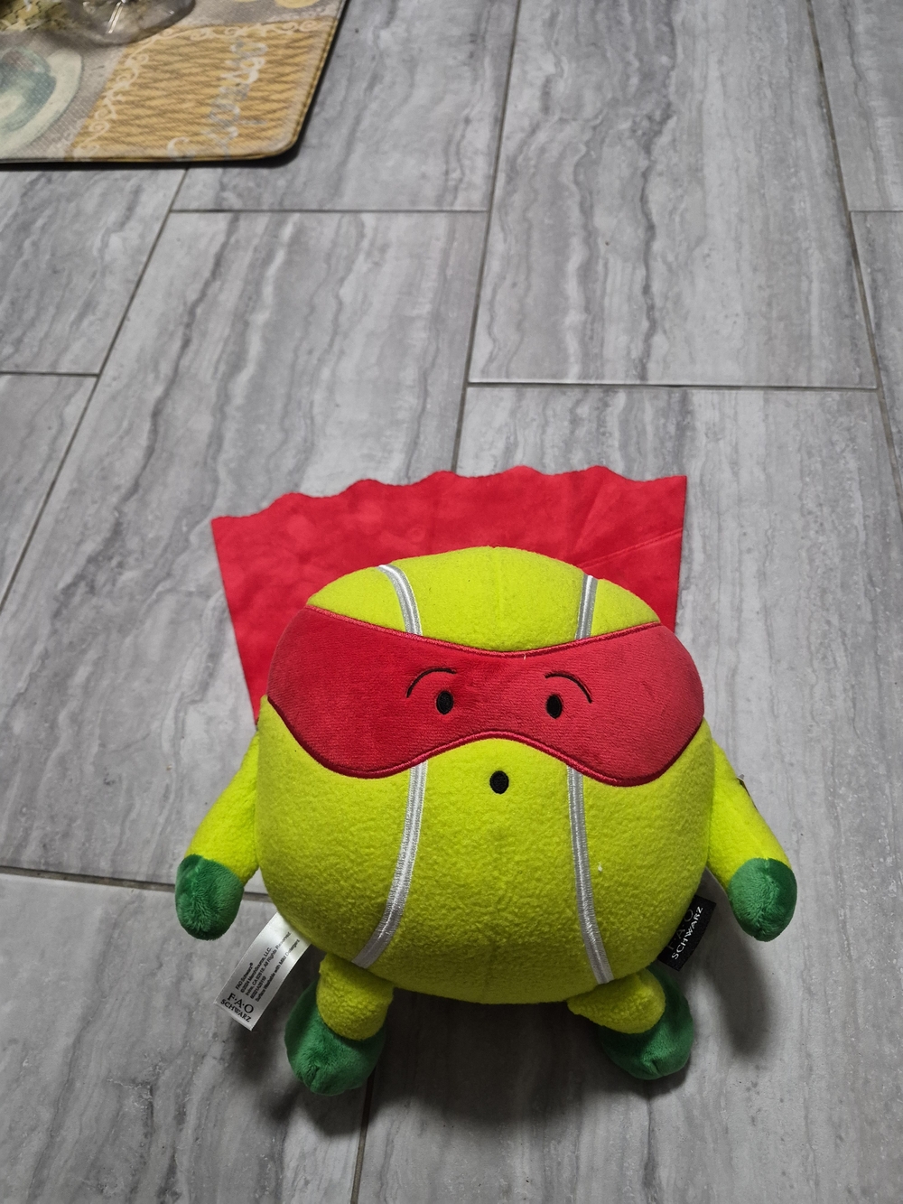 FAO Schwarz Yellow Tennis Ball Superhero Plush with Pink Mask and Cape